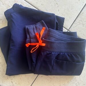 Figs Technical Collection Scrub Pants in Navy with Bright Orange Tie